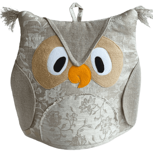 Textile heating pad for a teapot OWL